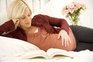 A pregnant woman relaxing